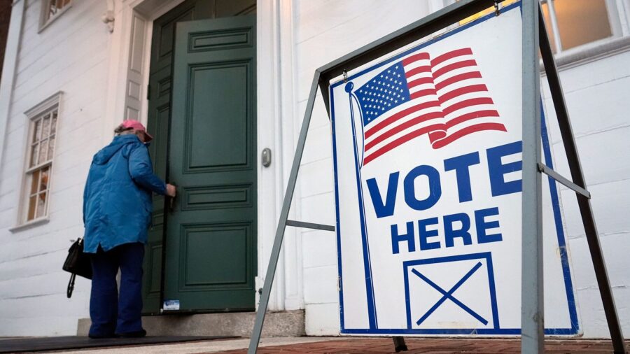 A voter enters the polling station in Kennebunk, Maine, Tuesday, March 5. Nearly two-thirds of Nort...