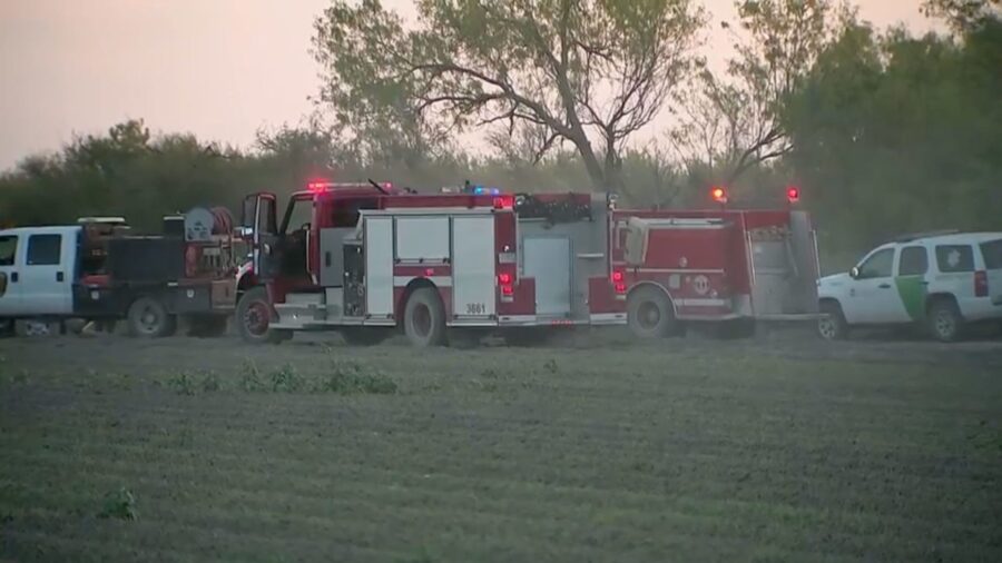Border Patrol and first responders on the scene of a helicopter crash in Starr County, Texas, on Fr...