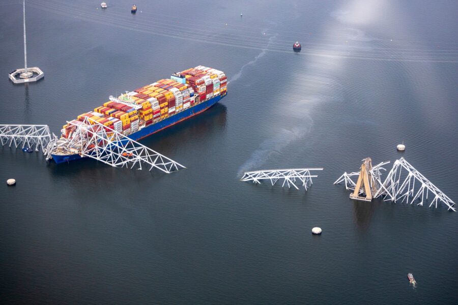 In an aerial view, cargo ship Dali is seen after running into and collapsing the Francis Scott Key ...
