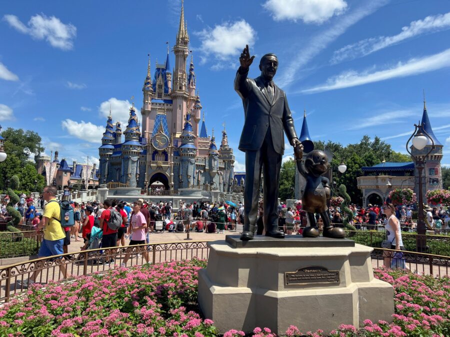 People gather at the Magic Kingdom theme park in Orlando, Florida, in 2022. Disney and Florida have...