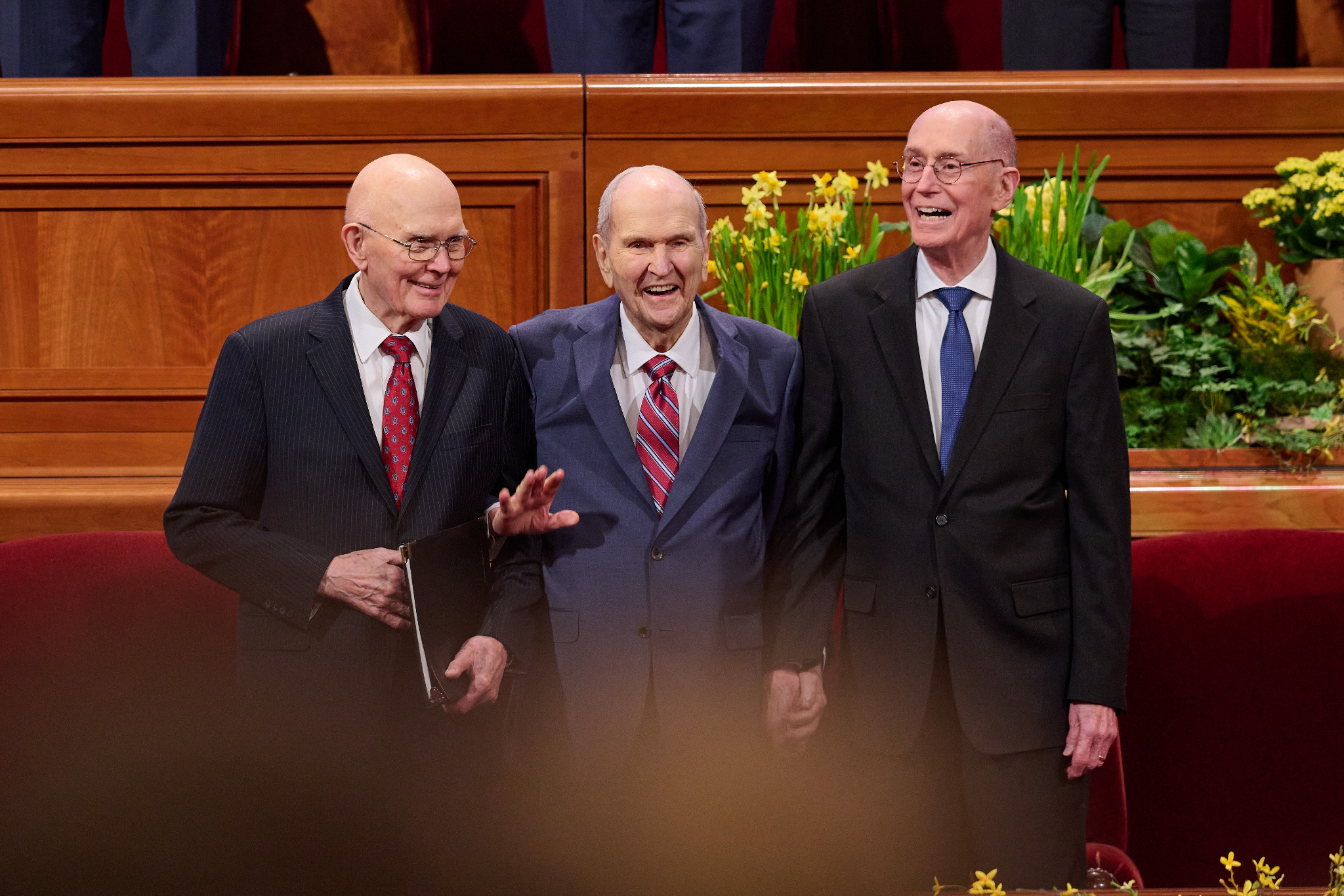 President Russell M. Nelson is surrounded by President Dallin H. Oaks (left) and President Henry B....