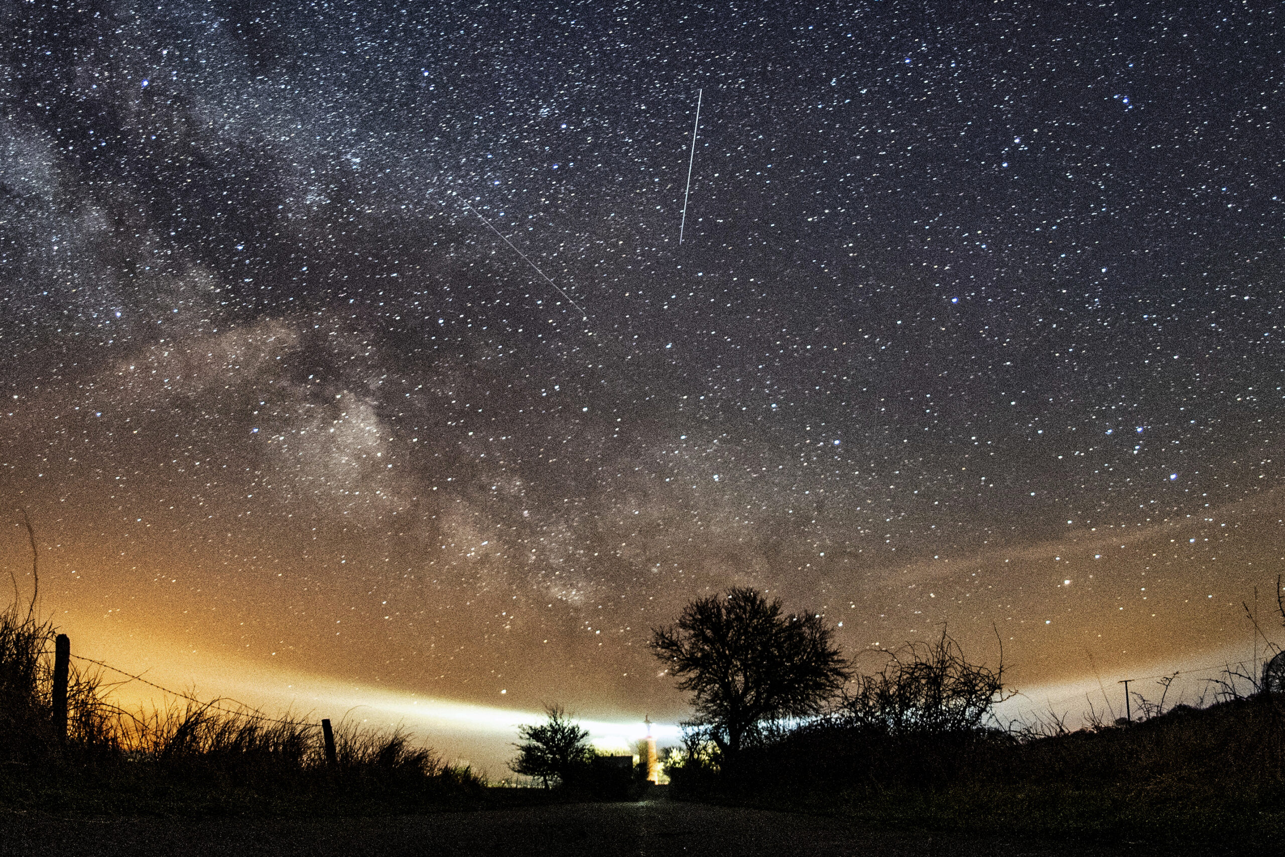 FILE - The Lyrid meteor shower is seen over Burg on the Baltic Sea island of Fehmarn off Germany, F...