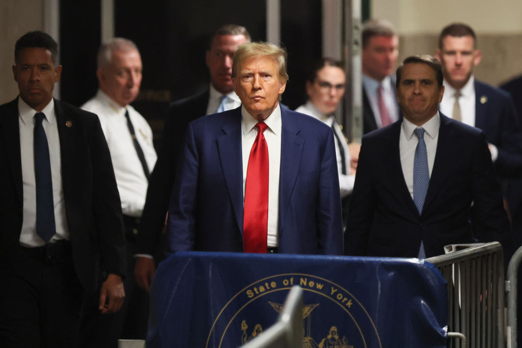 FILE: Former president Donald Trump prepares to speak to the media during a pre-trial hearing at Cr...