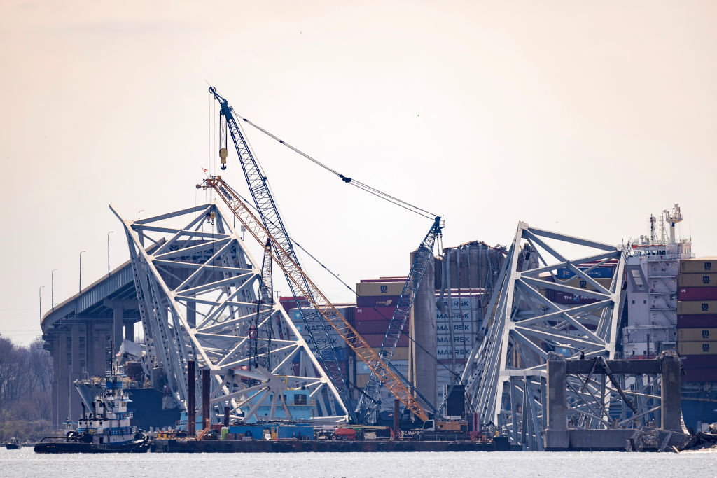 Debris is cleared from the collapsed Francis Scott Key Bridge as efforts begin to reopen the Port o...