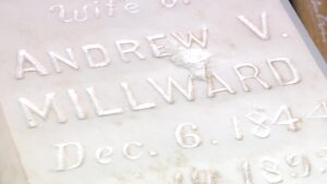 The old tombstone that was damaged with "ANDREW V. MILLWARD Dec. 6. 1844 Jan. 19. 1893" inscribed on it. (