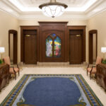 “The Resurrection.” The entrance of the second-floor patron waiting area in the Layton Utah Temple. The Tiffany glass art window was created in 1915, and was purchased from a United Presbyterian Church in Armenia New York, which was demolished in 2015. (The Church of Jesus Christ of Latter-day Saints) 