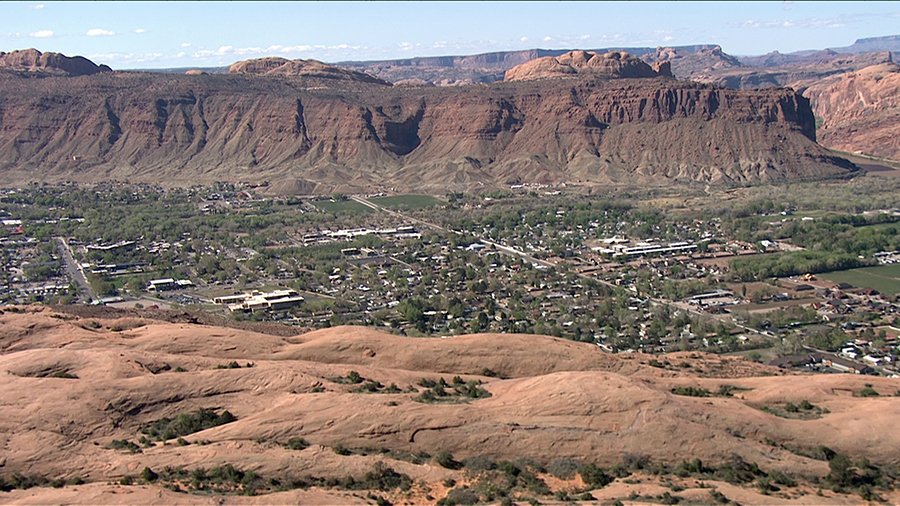 overview of Moab, a city nestled in red rock...