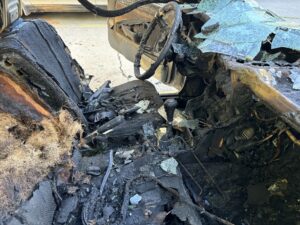 The inside of Quilter's dad's destroyed BMW.