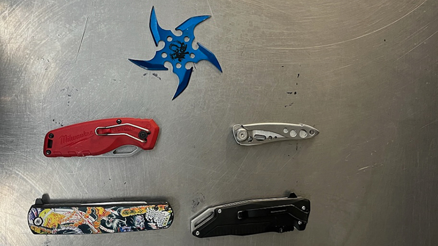 Salt Lake City Police officers seized four knives and a throwing star from a 23-year-old man arrest...