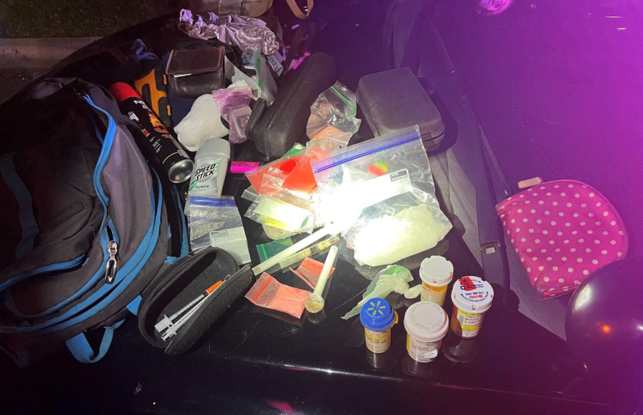 A photo of seized illegal drugs and paraphernalia from a traffic stop near 1500 South West Temple S...