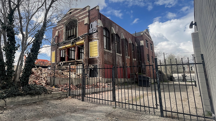 Crews began the process of demolition on a century-old church meeting house, and the operation was ...