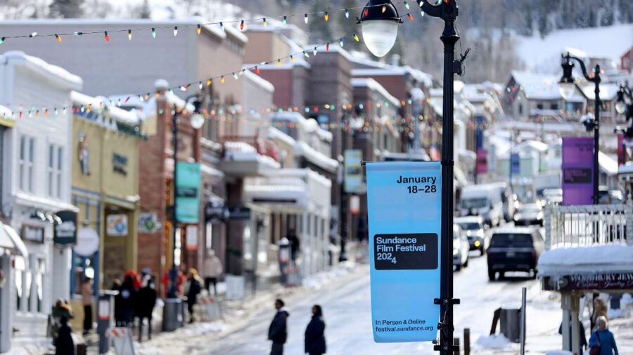 Signs are posted for the 2024 Sundance Film Festival on Maiin Street in Park City on Jan. 18. The f...