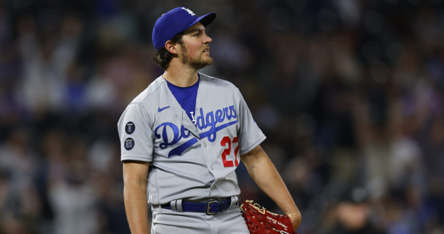 Starting pitcher Trevor Bauer #27 of the Los Angeles Dodgers reacts after giving up a two run home ...