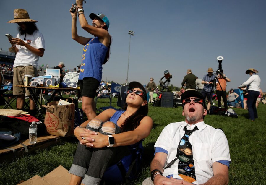 People watch the total solar eclipse in Madras, Oregon, in August 2017. April’s total solar eclip...