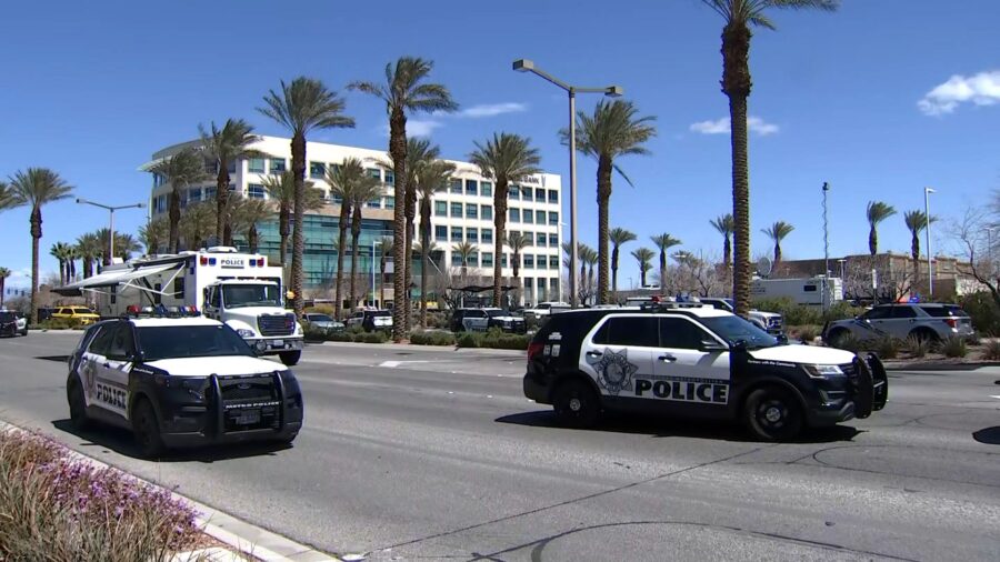 Police are seen at the scene of a shooting in Summerlin, Nevada, on April 8. (KVVU via CNN Newsourc...
