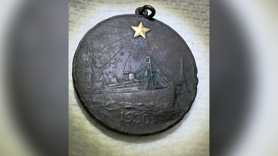 A fine bronze medallion produced by Tiffany & Company struck to honor the 1930 Gold Star Mothers an...