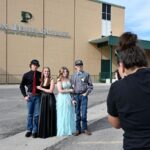 Jackson Walker, Melody Shoda, Kenadee Hopes and Remington Newpert pose while Cheriess Seastrand takes their photos at Payson High School before prom at the school on Saturday, April 20, 2024.