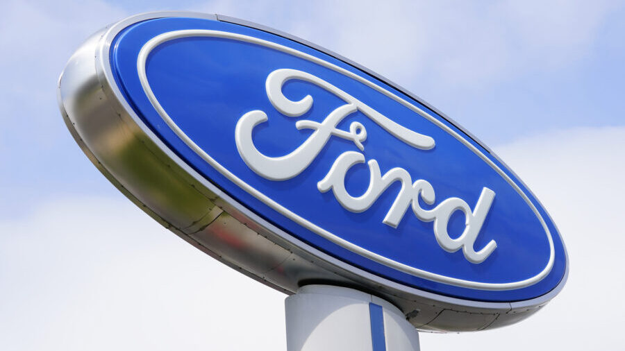 FILE - A Ford sign is shown at a dealership in Springfield, Pa., Tuesday, April 26, 2022.  Ford is ...