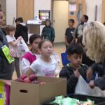 Families receiving food from the Bridging the Gap program. (Mike Anderson, KSL TV)