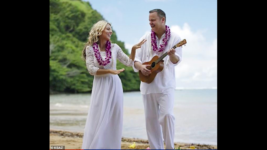 Lori and Chad Daybell in white clothes on a beach in Hawaii...