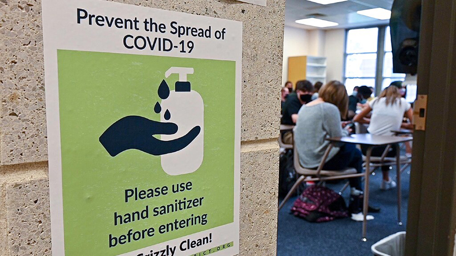 A sign reminding Copper Hills High School students and staff to keep their hands clean during the c...