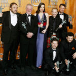 LOS ANGELES - FEBRUARY 22:  (L-R) Actors John Rhys-Davies, Bernard Hill, Liv Tyler, Billy Boyd, John Noble, Sean Astin, and Andy Serkis pose backstage with their awards for Outstanding Performance by a Cast in a Motion Picture for "Lord of the Rings: The Return of the King" during the 10th Annual Screen Actors Guild Awards at the Shrine Auditorium on February 22, 2004 in Los Angeles, California.  (Photo by Carlo Allegri/Getty Images)