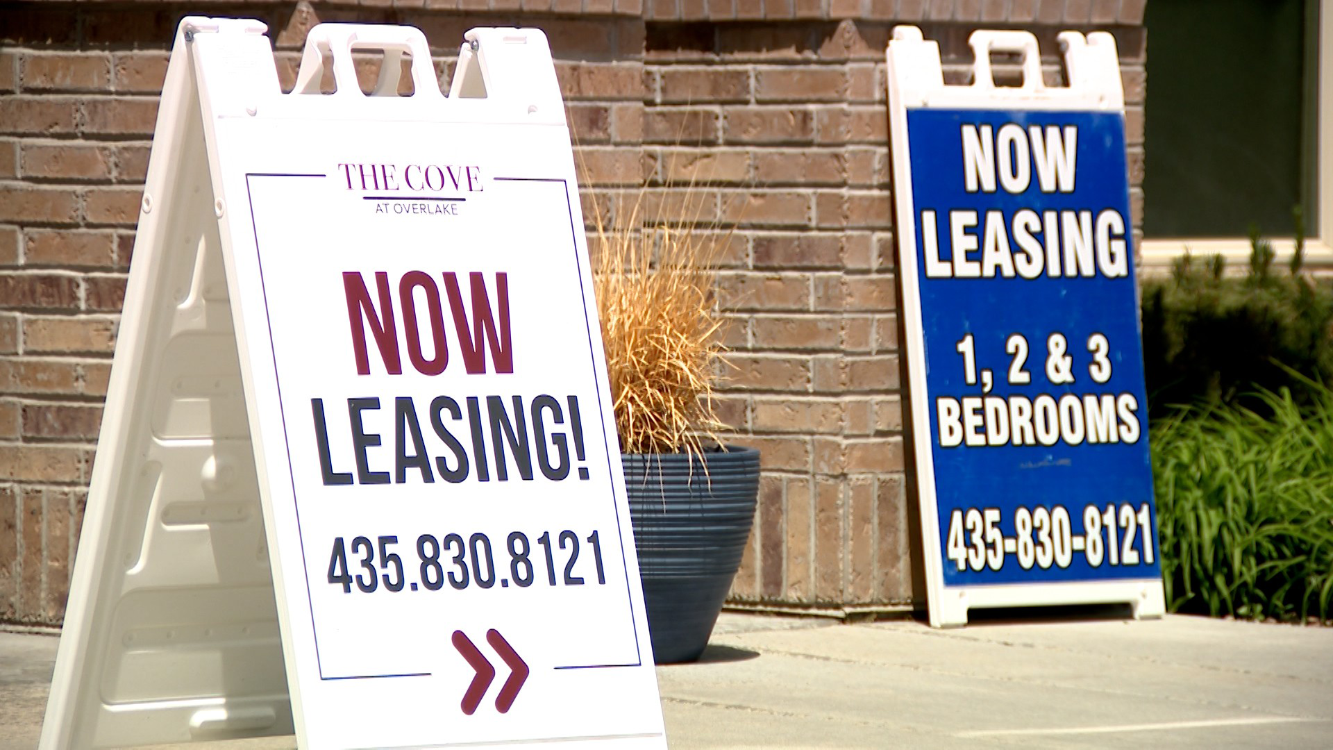 (FILE) Two signs advertising bedrooms for rent....