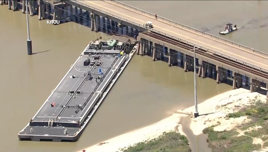 Aerials over a barge that has collided with a bridge near Galveston, Texas. (KHOU via CNN)...