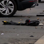 Police gear on the ground after a Unified police officer was hit by a suspect's car. (KSL TV) 