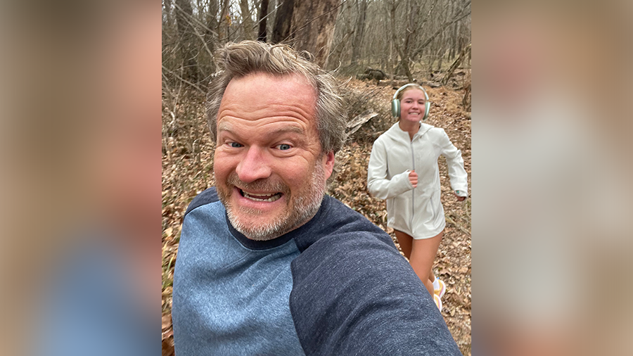 Dr. Adam Balls out on a run with his daughter as part of his self-care routine....