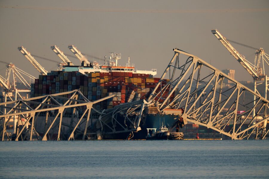 The cargo ship Dali trapped under the remains of the Francis Scott Key Bridge in Baltimore, Marylan...