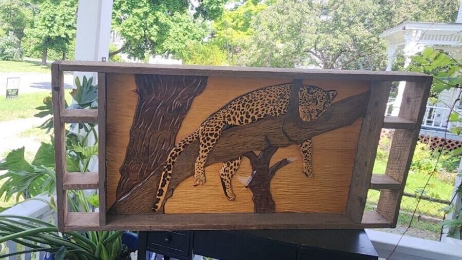 Chuck Perkins's 1980 carving of a cheetah went on a long journey to find its way home. (Courtesy Ce...