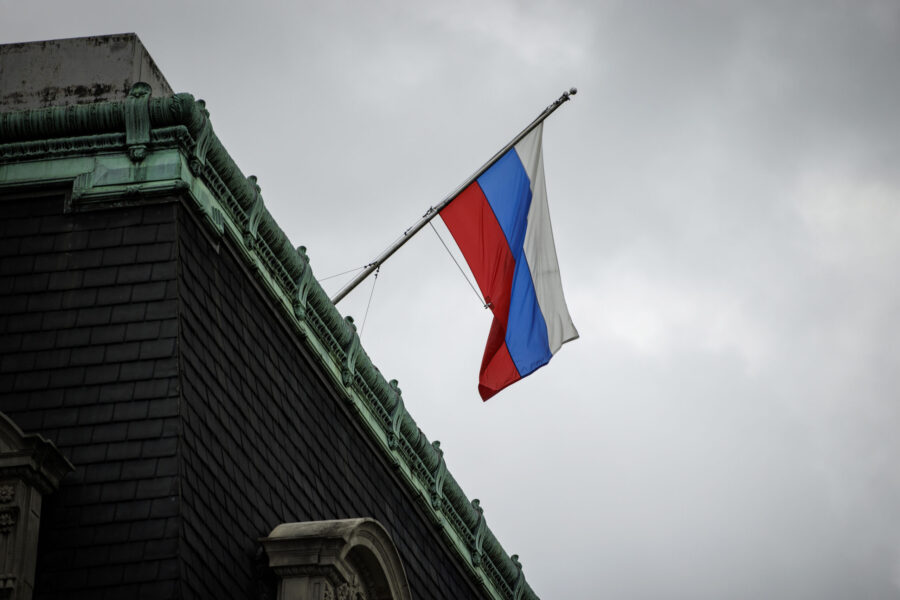 FILE - The Russian flag flies above the Russian Ambassador's residence a few blocks north of the Wh...