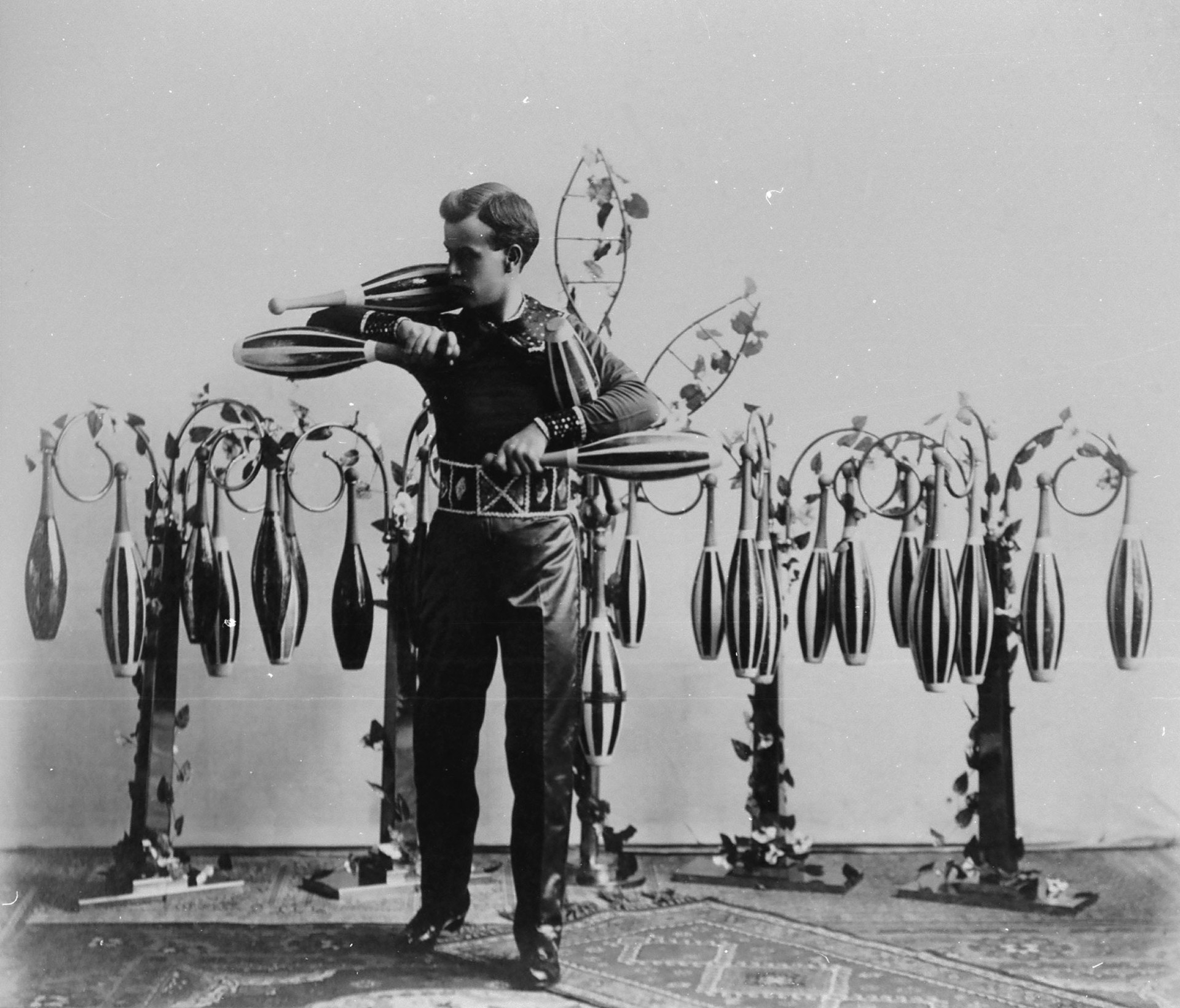 A photo of John Phillip Thomas with his juggling equipment. 