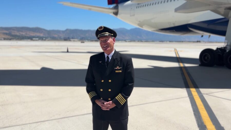 Captain Mark Braby outside of the custom Olympic aircraft that flew from Paris to LA....