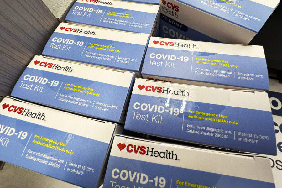 At-Home COVID-19 Test kits are displayed at a drug store in Buffalo Grove, Ill., Monday, Aug. 26, 2...