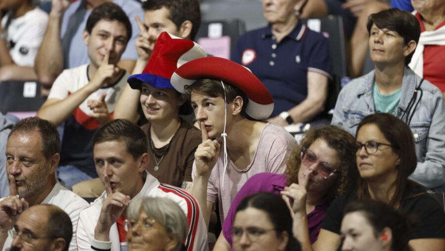 A group of fans shush the crowd as the "Shh Cam" scans the audience during the mens' United States ...