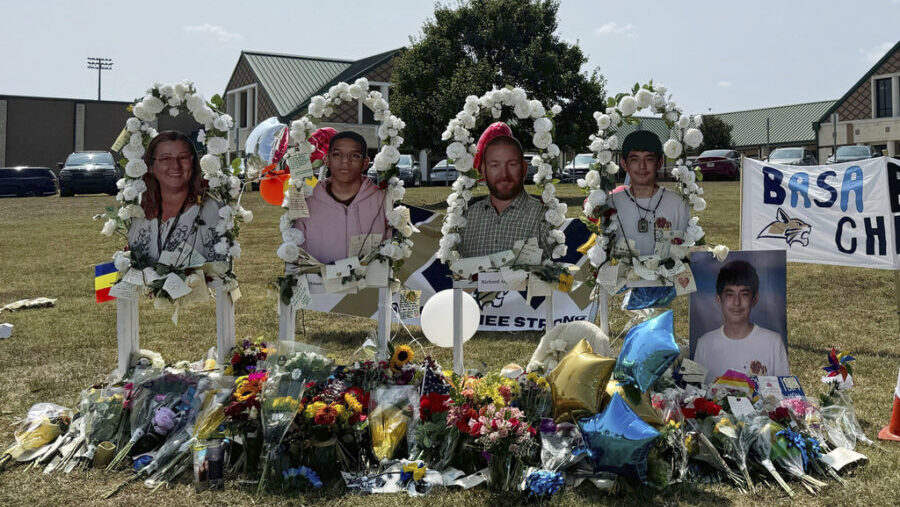 A poster with images of shooting victims from left, Cristina Irimie, Mason Schermerhorn, Richard As...