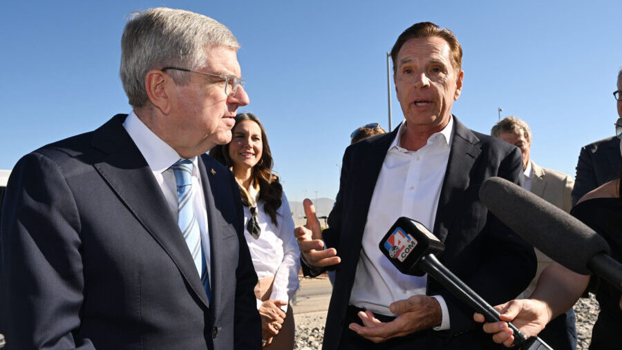 Fraser Bullock joins with International Olympic Committee President Thomas Bach to talk with media ...