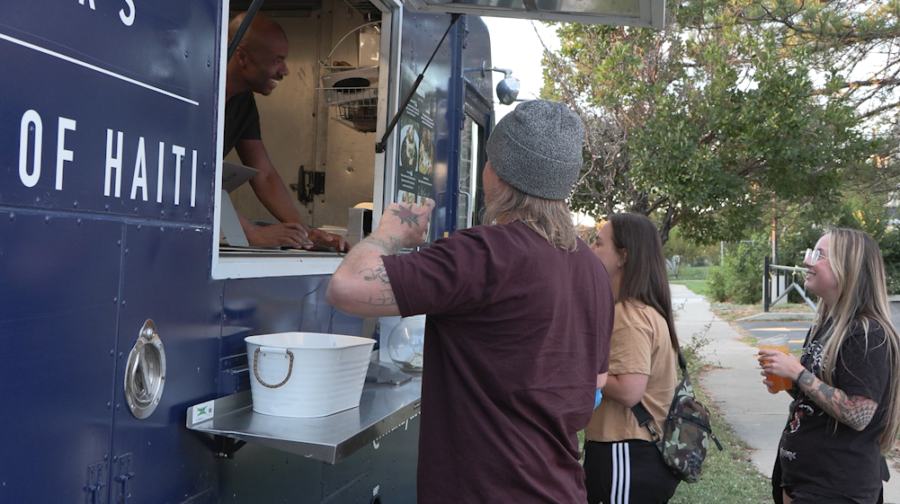 Roody Salvatore and two employees stayed busy inside the Makaya Caters food truck, cooking up Haiti...