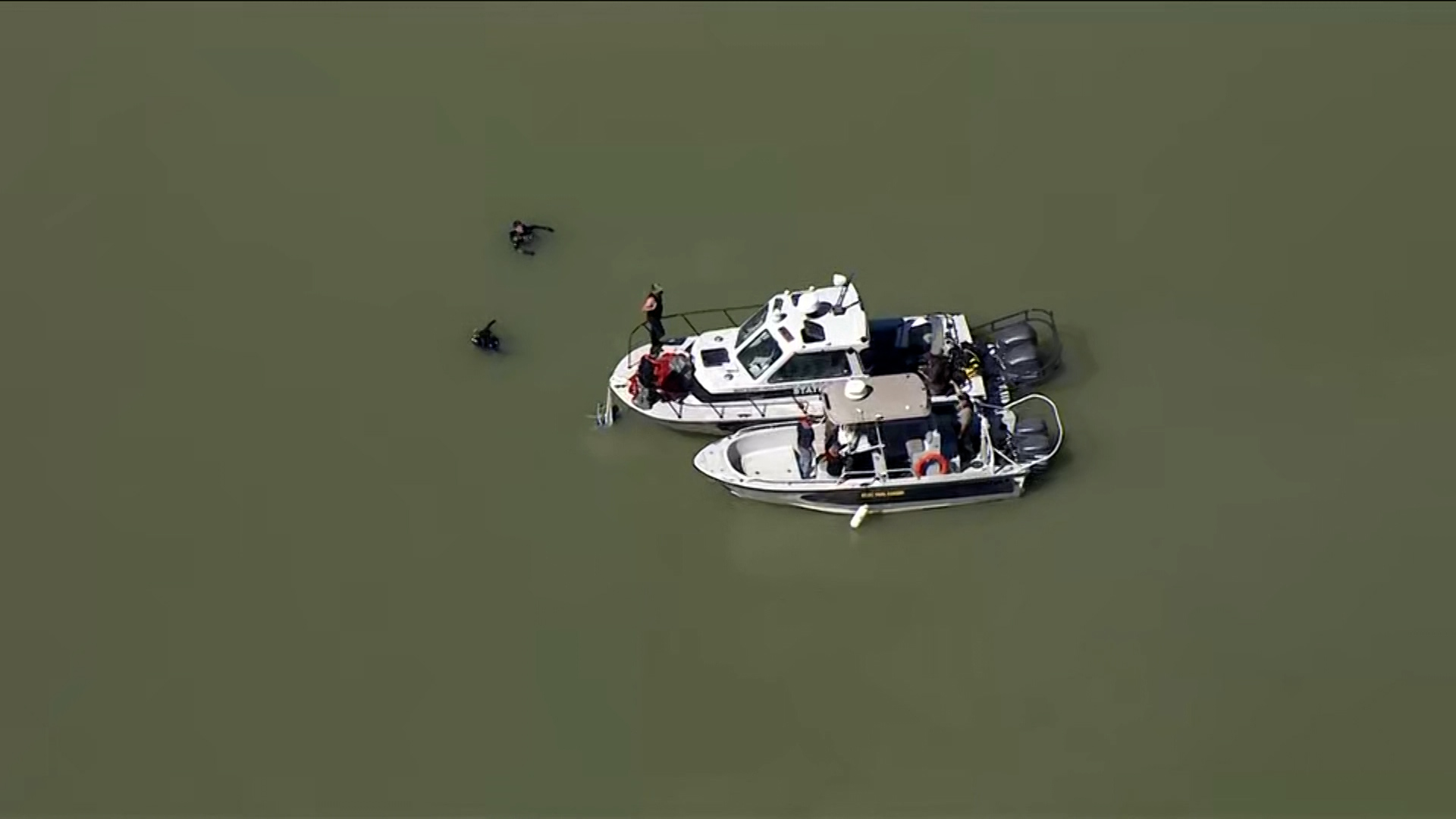 Divers search Utah Lake for remains of the plane crash on September 27, 2024.