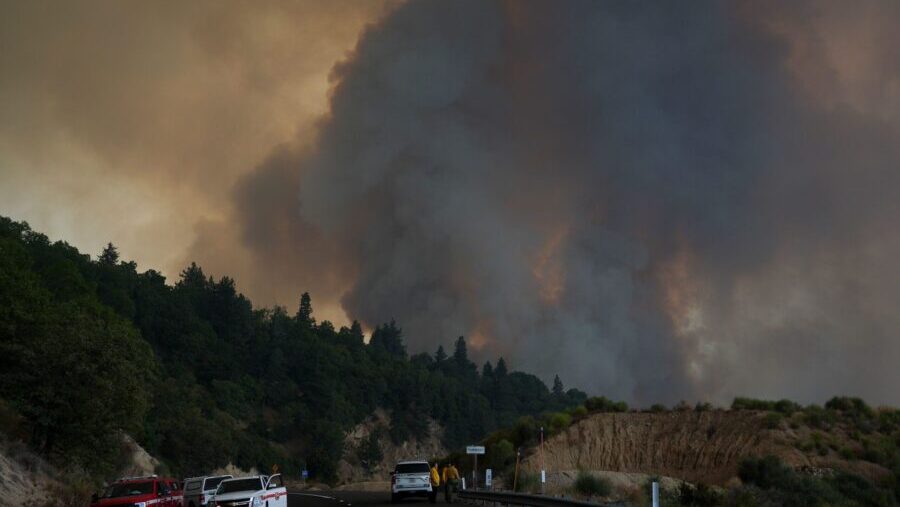 Fire crews monitor the Line Fire on Saturday, Sept. 9, 2024, near Running Springs, California. Some...