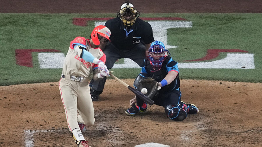 American League's Jarren Duran, of the Boston Red Sox, hits a home run during the fifth inning of t...