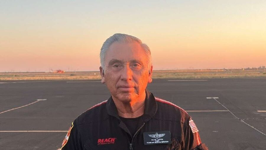 Emergency medical services worker Dan Laguna, of Salt Lake City, stands at airfield before work. (A...