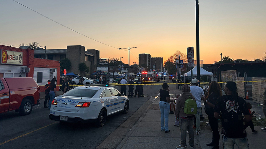 Police respond to the scene of a shooting at Jefferson Street and 26th Avenue in Nashville on Octob...