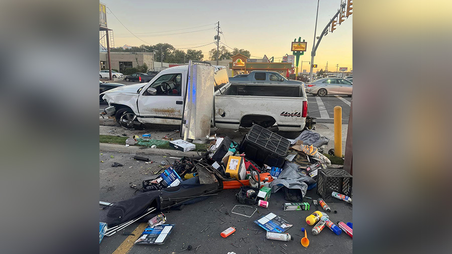 The scene of a car crash involving a police officer and two other cars....