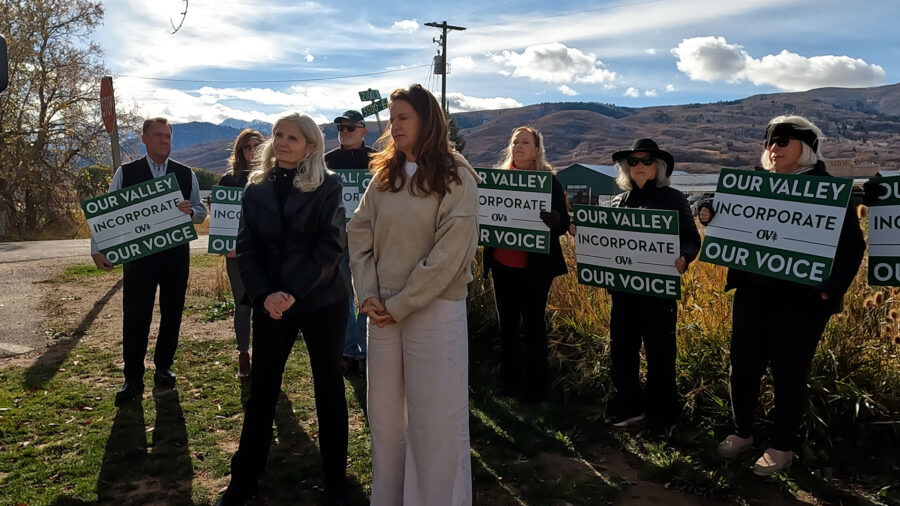 Supporters of 'Our Valley, Our Voice' hold signs supporting the ballot measure on Nov. 4, 2024. (Mi...