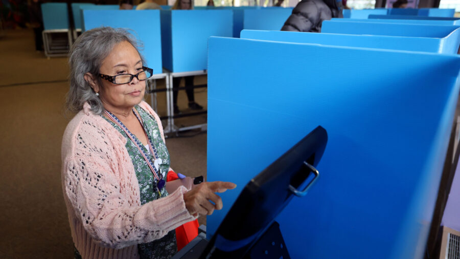 Wandee Wimuttasee Mann votes early at the Salt Lake County Government Center in Salt Lake City on W...